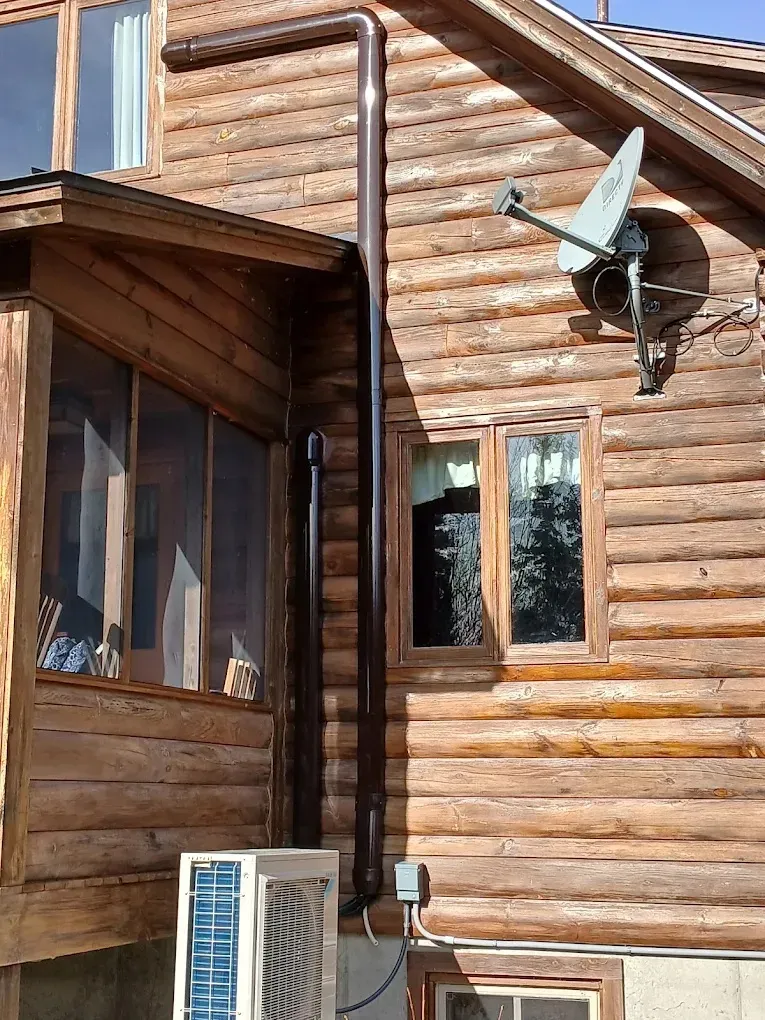 Spring AC Tune-Up: Prepare Your Air Conditioner for Summer 3 HVAC technician conducting a thorough inspection of an air conditioning unit